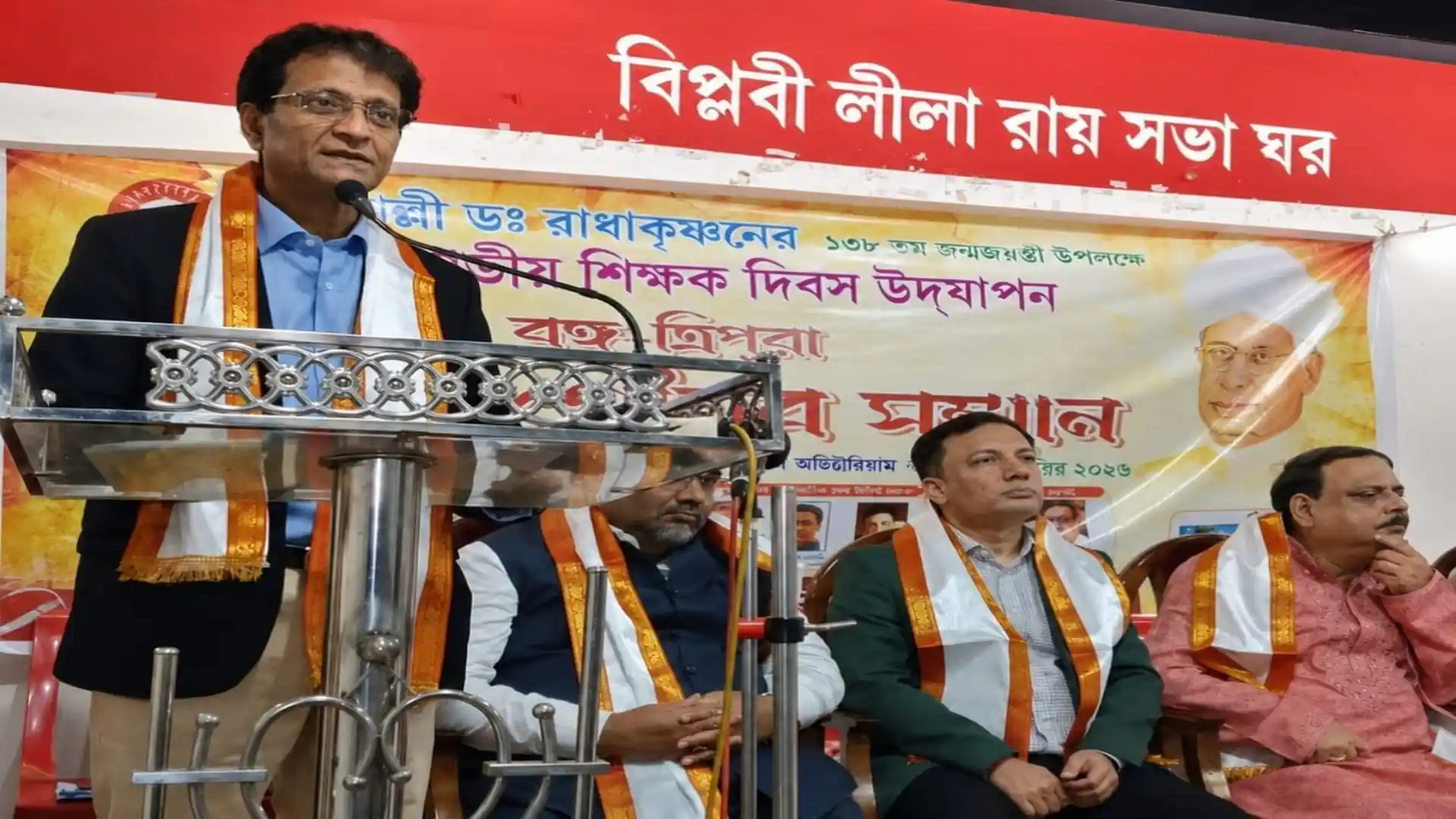 Abhijit Bhattacharjee addressing the gathering from the podium