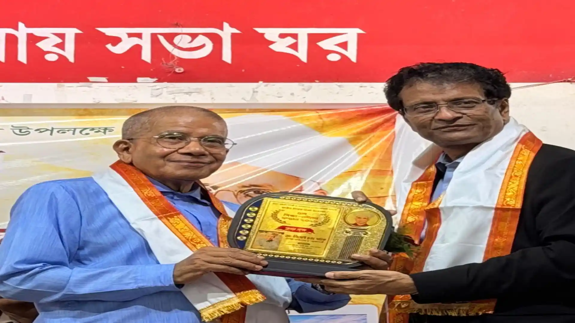 Lifetime Achievement Award presented to Abhijit Bhattacharjee on stage