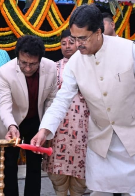 Chief guest lighting the ceremonial lamp