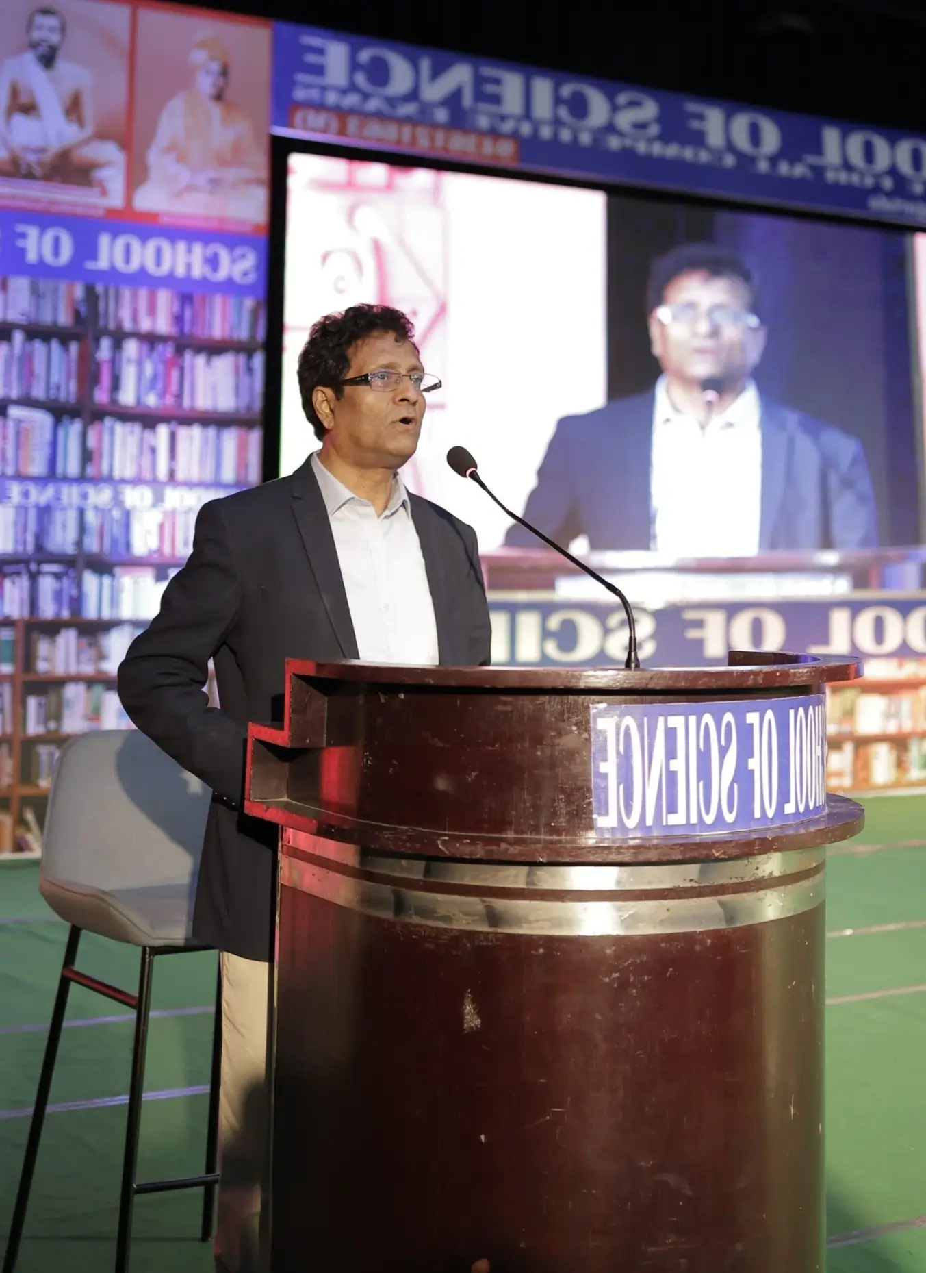 A School of Science mentor addressing the audience at an event